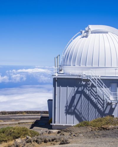 A huge astronomical observatory against the blue sky in Spain